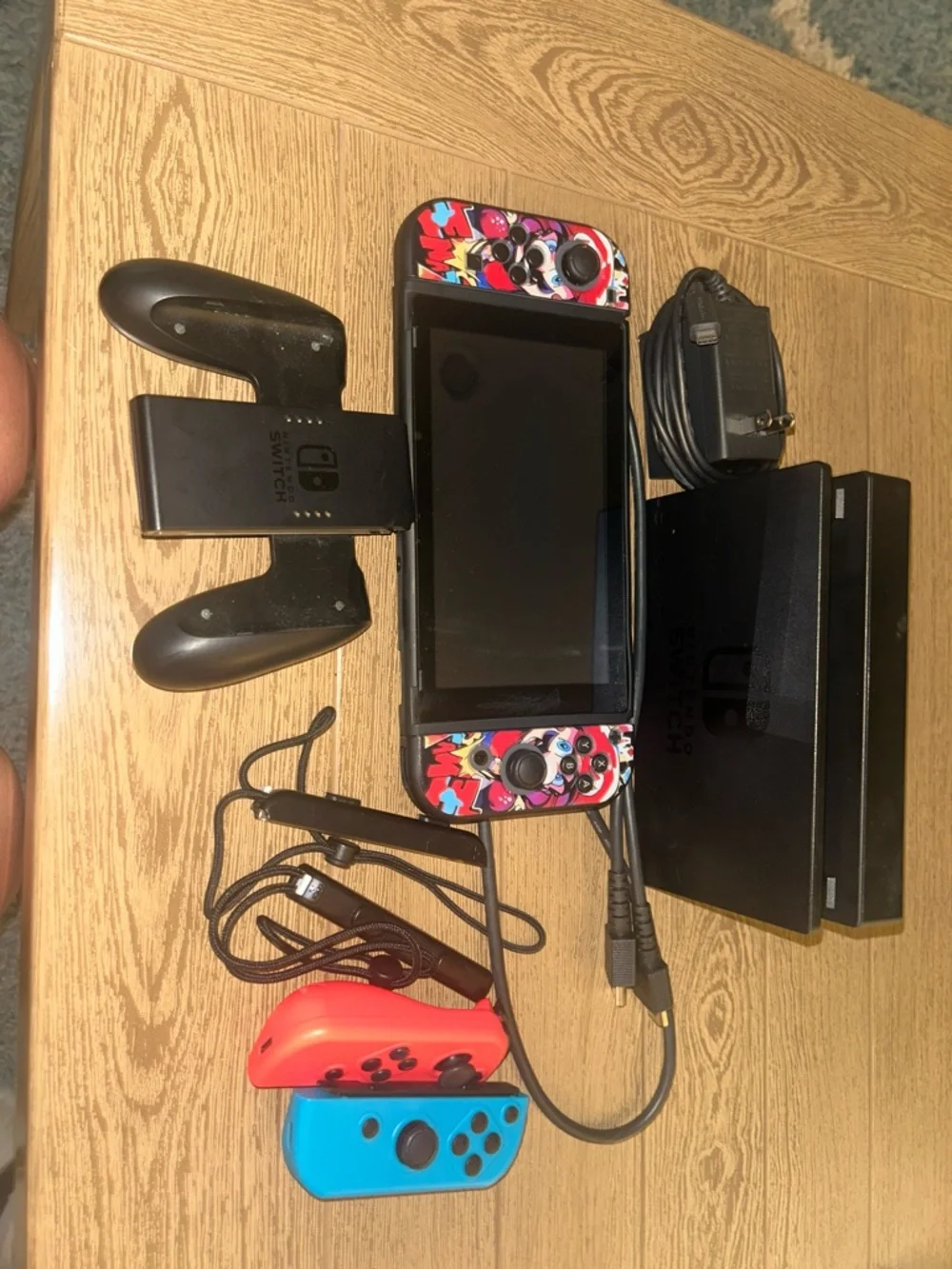 Nintendo Switch with Red, Blue, Black Graphic Controller Wraps